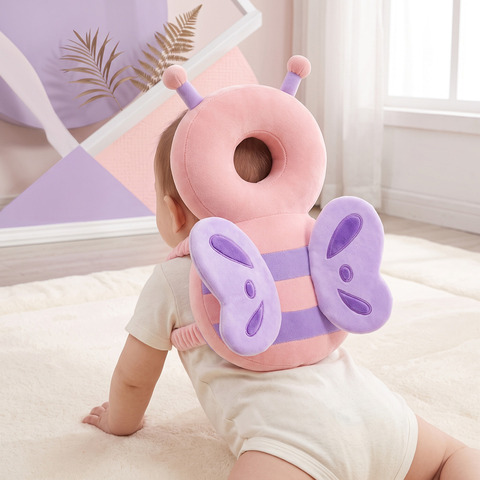 Baby wearing the adjustable Berry Fairy head protector